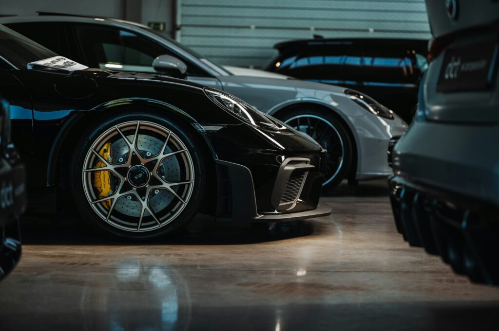 Performance car wheel in a garage